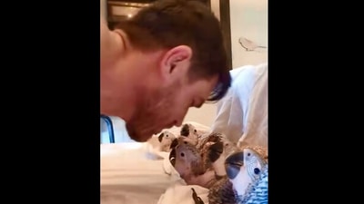 The image, taken from the Reddit video, shows the man with his pet birds. (Reddit/@Mint_Perspective)