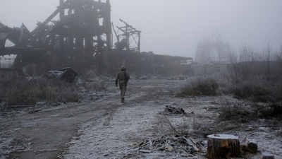 In this Nov. 19, 2019 file photo, a Ukrainian soldier passes by a destroyed Butovka coal mine as he approaches his front line position in the town of Avdiivka in the Donetsk region, Ukraine. (AP) In this Nov. 19, 2019 file photo, a Ukrainian soldier passes by a destroyed Butovka coal mine as he approaches his front line position in the town of Avdiivka in the Donetsk region, Ukraine. (AP)