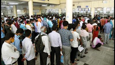 Attendants of patients stand in a queue for registration at IGIMS, in Patna, on Tuesday. (Santosh Kumar/HT Photo) Attendants of patients stand in a queue for registration at IGIMS, in Patna, on Tuesday. (Santosh Kumar/HT Photo)