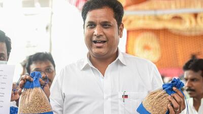 DMK MLA T.R.B. Rajaa shows a rare type of paddy as he arrives to attend the Tamil Nadu Agriculture Budget session for financial year 2022-23, at Fort St George, in Chennai, on Saturday. (PTI) DMK MLA T.R.B. Rajaa shows a rare type of paddy as he arrives to attend the Tamil Nadu Agriculture Budget session for financial year 2022-23, at Fort St George, in Chennai, on Saturday. (PTI)