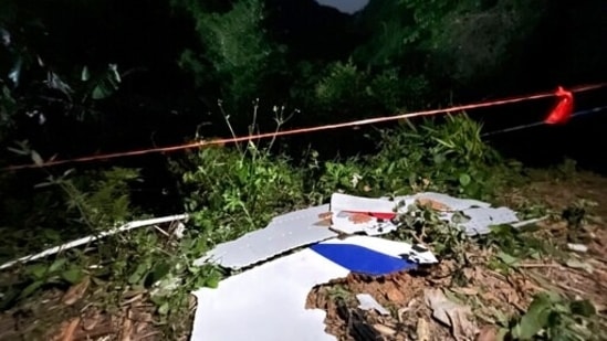 The plane crashed on a wooded mountainside and ignited a fire big enough to be seen on NASA satellite images.(AP)