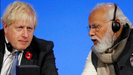 Russia-Ukraine crisis: Britain's Prime Minister Boris Johnson (L) and India's Prime Minister Narendra Modi spoke on the phone on Tuesday. (AFP File Photo)
