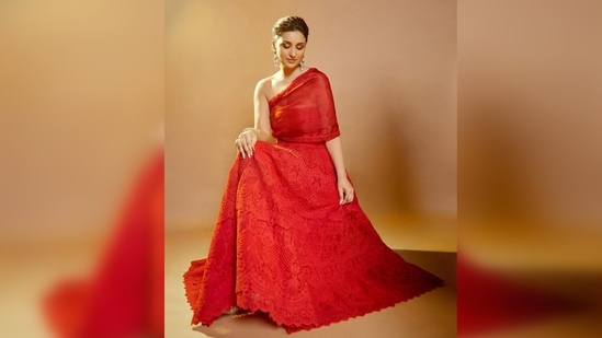 Parineeti Chopra is the perfect personification of love in this red gown which she teamed with statement pearl earrings.(Instagram/@parineetichopra)