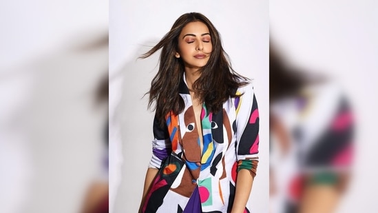 Sharing a series of photos in an outfit with the hues of spring, Rakul Preet captioned her post, "It’s a colorful day #runway34 trailer out now."(Instagram/@rakulpreet)