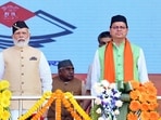 Prime Minister Narendra Modi with Uttarakhand Governor Lt. General (retd.) Gurmit Singh and Uttarakhand CM Pushkar Singh Dhami, during the oath taking ceremony of Dhami, in Dehradun. (PTI) Prime Minister Narendra Modi with Uttarakhand Governor Lt. General (retd.) Gurmit Singh and Uttarakhand CM Pushkar Singh Dhami, during the oath taking ceremony of Dhami, in Dehradun. (PTI)