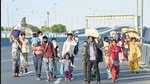 A group of migrant workers from Madhya Pradesh walk along NH-24 (near Nizamuddin Bridge) to Sarai Kale Khan Bus stand in New Delhi, amid the Covid-induced nationwide lockdown, on March 29, 2020. (Ajay Aggarwal/HT photo) A group of migrant workers from Madhya Pradesh walk along NH-24 (near Nizamuddin Bridge) to Sarai Kale Khan Bus stand in New Delhi, amid the Covid-induced nationwide lockdown, on March 29, 2020. (Ajay Aggarwal/HT photo)