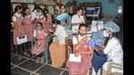 Life and work are almost back to normal in India; providing booster shots to everyone over the age of 18 will ensure it stays that way (PTI) Life and work are almost back to normal in India; providing booster shots to everyone over the age of 18 will ensure it stays that way (PTI)