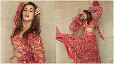 Huma Qureshi, an avid social media user and a fashion enthusiast, can make any outfit look great on her. From street style look to girly subtle outfits, the actor sure knows how to pull off all her attires effortlessly. The Gangs of Wasseypur actor recently treated her fans with beautiful pictures of herself in a red floral crop top, skirt and cape set by ace Indian designer Anamika Khanna. (Instagram/@iamhumaq) Huma Qureshi, an avid social media user and a fashion enthusiast, can make any outfit look great on her. From street style look to girly subtle outfits, the actor sure knows how to pull off all her attires effortlessly. The Gangs of Wasseypur actor recently treated her fans with beautiful pictures of herself in a red floral crop top, skirt and cape set by ace Indian designer Anamika Khanna. (Instagram/@iamhumaq)
