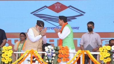 Prime Minister Narendra Modi attended the oath ceremony of Uttarakhand chief minister Pushkar Singh Dhami at Dehradun’s Parade Ground on Wednesday (HT Photo/Rajeev Kaka)