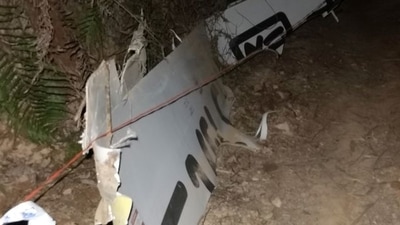Plane debris is seen at the site where a China Eastern Airlines Boeing 737-800 plane flying from Kunming to Guangzhou crashed. cnsphoto via REUTERS (VIA REUTERS)