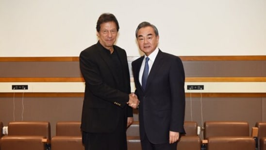 Pakistan prime minister Imran Khan with Chinese foreign minister Wang Yi
