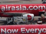 An AirAsia India flight rolled back 100 feet at the Kempegowda International Airport after landing safely on Tuesday. (AP Photo/Vincent Thian)(AP) An AirAsia India flight rolled back 100 feet at the Kempegowda International Airport after landing safely on Tuesday. (AP Photo/Vincent Thian)(AP)