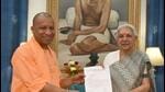 Yogi Adityanath calls on Uttar Pradesh governor Anandiben Patel after he was elected leader of the BJP legislative party. (HT Photo) Yogi Adityanath calls on Uttar Pradesh governor Anandiben Patel after he was elected leader of the BJP legislative party. (HT Photo)