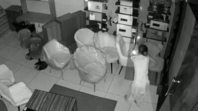 CCTV camera installed inside the store shows a member of the women’s gang stealing cash from the store in Ludhiana. (HT File) CCTV camera installed inside the store shows a member of the women’s gang stealing cash from the store in Ludhiana. (HT File)