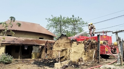Firemen douse the fire at the incident site where several houses were allegedly set on fire leaving eight people dead, at Rampurhat, in Birbhum on Tuesday. (ANI)