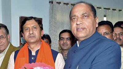 Himachal Pradesh chief minister Jai Ram Thakur (right) congratulating Sikandar Kumar for being elected unopposed to Rajya Sabha, in Shimla on Thursday. (ANI)