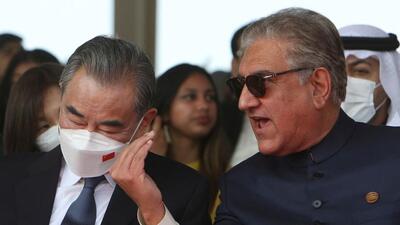 Pakistani foreign minister Shah Mahmood Qureshi (right) speaks with his Chinese counterpart Wang Yi during the Pakistan Day parade in Islamabad on Wednesday. (AFP) Pakistani foreign minister Shah Mahmood Qureshi (right) speaks with his Chinese counterpart Wang Yi during the Pakistan Day parade in Islamabad on Wednesday. (AFP)