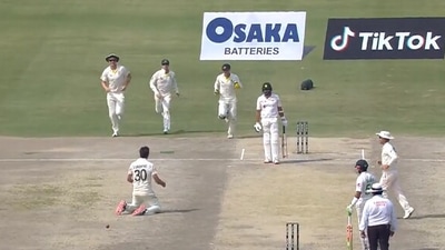 Pat Cummins takes a stunning catch to dismiss Azhar Ali. (Twitter) Pat Cummins takes a stunning catch to dismiss Azhar Ali. (Twitter)