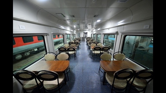 The dining car has been upgraded with new chairs and wooden tables (ICF Chennai)