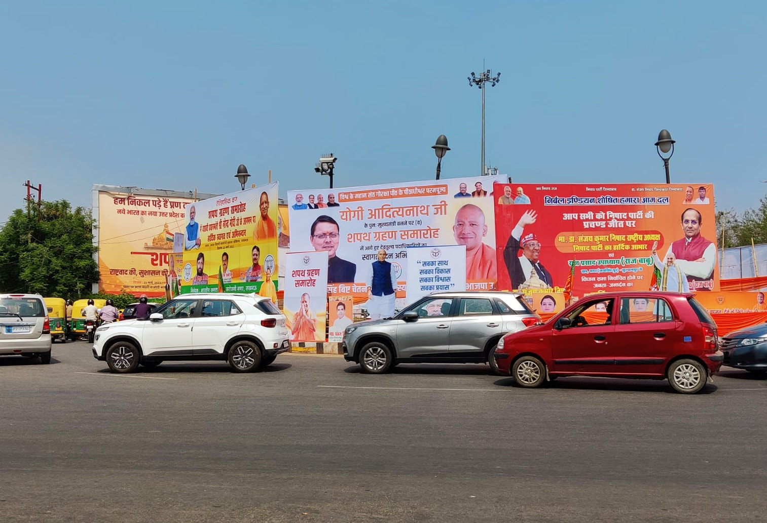 Hoardings are installed as part of preparations of the oath-taking ceremony of BJP leader Yogi Adityanath as Uttar Pradesh chief minister for the second time, which is scheduled on March 25. (ANI Photo) (ANI) Hoardings are installed as part of preparations of the oath-taking ceremony of BJP leader Yogi Adityanath as Uttar Pradesh chief minister for the second time, which is scheduled on March 25. (ANI Photo) (ANI)
