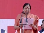 Baby Rani Maurya takes oath as a minister in the Yogi Adityanath cabinet at Lucknow's Ekana Stadium on Friday(Twitter/ANI) Baby Rani Maurya takes oath as a minister in the Yogi Adityanath cabinet at Lucknow's Ekana Stadium on Friday(Twitter/ANI)