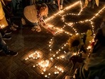 Members of the Ukrainian community take part in a vigil to protest against the Russian invasion of Ukraine, in Santiago.