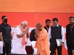 Prime Minister Narendra Modi greets Uttar Pradesh chief minister Yogi Adityanath at the Atal Bihari Vajpayee Ekana Stadium in Lucknow(Deepak Gupta)