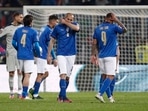 Italy's Giorgio Chiellini and teammates look dejected after match against North Macedonia