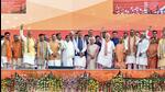 Prime Minister Narendra Modi with Uttar Pradesh chief minister Yogi Adityanath and others at the swearing-in ceremony at Atal Bihari Ekana Stadium in Lucknow on Friday. (PTI) Prime Minister Narendra Modi with Uttar Pradesh chief minister Yogi Adityanath and others at the swearing-in ceremony at Atal Bihari Ekana Stadium in Lucknow on Friday. (PTI)