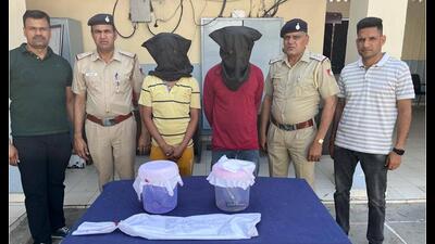 The two accused in the custody of the Chandigarh Police on Friday. (HT Photo) The two accused in the custody of the Chandigarh Police on Friday. (HT Photo)