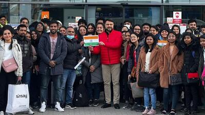 Amit Lath with students who were evacuated from Ukraine during their stopover in Poland before they could catch flights back home. (SOURCED.) Amit Lath with students who were evacuated from Ukraine during their stopover in Poland before they could catch flights back home. (SOURCED.)