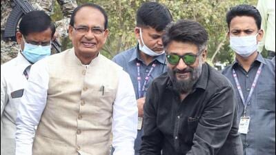 Madhya Pradesh chief minister Shivraj Singh Chouhan and director Vivek Agnihotri water newly planted saplings at Smart Park in Bhopal on Friday. (PTI PHOTO.) Madhya Pradesh chief minister Shivraj Singh Chouhan and director Vivek Agnihotri water newly planted saplings at Smart Park in Bhopal on Friday. (PTI PHOTO.)