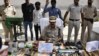 Gurugram, India - March. 25, 2022: Gurugram police presents a 30-year-old man, arrested for allegedly running an illegal weapon manufacturing unit from his house in Uttar Pradesh’s Aligarh, during a press conference, in Gurugram, India, on Friday, March 25, 2022. (Photo by Vipin Kumar/ Hindustan Times) (Vipin Kumar/HT PHOTO) Gurugram, India - March. 25, 2022: Gurugram police presents a 30-year-old man, arrested for allegedly running an illegal weapon manufacturing unit from his house in Uttar Pradesh’s Aligarh, during a press conference, in Gurugram, India, on Friday, March 25, 2022. (Photo by Vipin Kumar/ Hindustan Times) (Vipin Kumar/HT PHOTO)