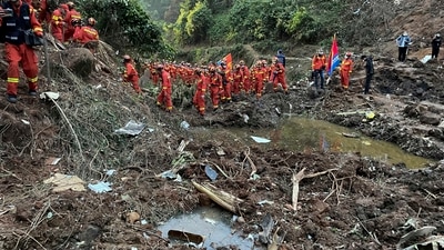 Tengxian County: In this photo released by Xinhua News Agency, rescuers conduct search operations at the site of a plane crash. (AP) Tengxian County: In this photo released by Xinhua News Agency, rescuers conduct search operations at the site of a plane crash. (AP)