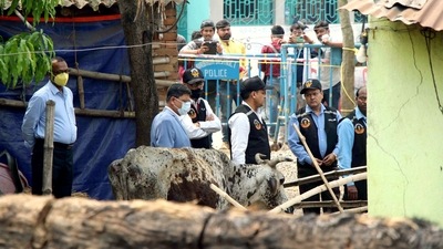 The CBI's Central Forensic Science Laboratory (CFSL) experts collect samples from the houses at Bogtui village, in Birbhum on Friday. (ANI)