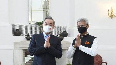 S Jaishankar and Wang Yi seen with folded hands in a photo tweeted by the foreign minister. (Twitter) S Jaishankar and Wang Yi seen with folded hands in a photo tweeted by the foreign minister. (Twitter)
