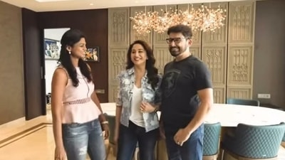 Madhuri Dixit and Sriram Nene in their new house with interior designer Apoorva Shroff. Madhuri Dixit and Sriram Nene in their new house with interior designer Apoorva Shroff.