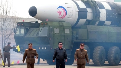 This picture shows North Korean leader Kim Jong Un (C) walking near what state media report says a new type inter-continental ballistic missile (ICBM). (AFP) This picture shows North Korean leader Kim Jong Un (C) walking near what state media report says a new type inter-continental ballistic missile (ICBM). (AFP)