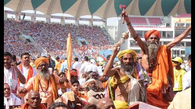 Sadhus reach to attend oath-taking ceremony of UP goverment at Ekana stadium in Lucknow on Friday. (Deepak Gupta/HT Photo)