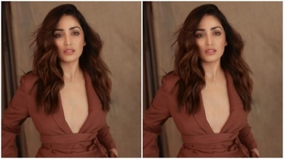 Yami paired a midriff-baring maroon blazer with a belt near to the waist with a pair of maroon formal trousers as she posed for the pictures. (Instagram/@yamigautam)