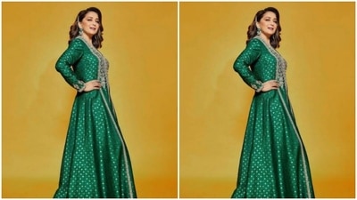 In emerald earrings, silver hairclip and minimal makeup, Madhuri looked ravishing. (Instagram/@gauravguptaofficial)