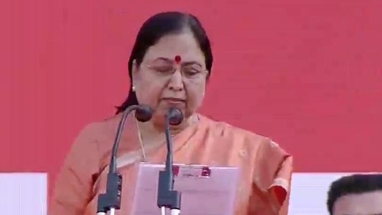 Baby Rani Maurya takes oath as a minister in the Yogi Adityanath cabinet at Lucknow's Ekana Stadium on Friday(Twitter/ANI) Baby Rani Maurya takes oath as a minister in the Yogi Adityanath cabinet at Lucknow's Ekana Stadium on Friday(Twitter/ANI)
