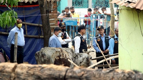 The CBI's Central Forensic Science Laboratory (CFSL) experts collect samples from the houses at Bogtui village, in Birbhum on Friday.(ANI)