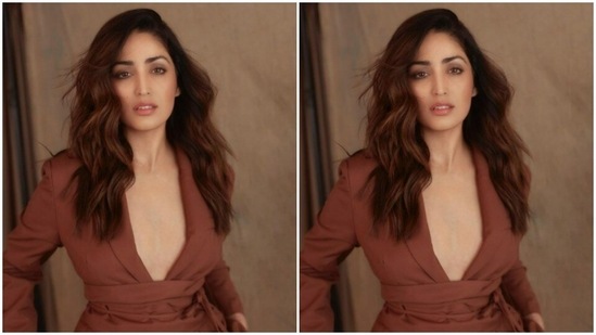 Yami paired a midriff-baring maroon blazer with a belt near to the waist with a pair of maroon formal trousers as she posed for the pictures.(Instagram/@yamigautam)