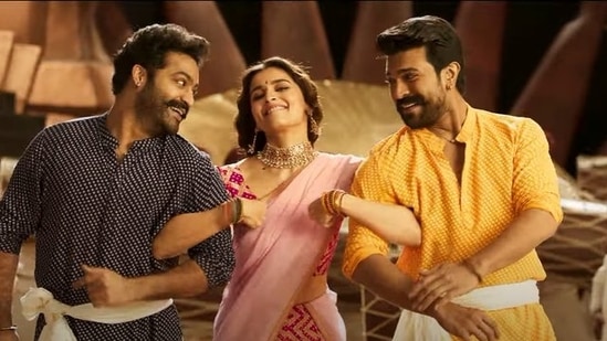 Alia Bhatt, Ram Charan and Jr NTR in a still from RRR's new song Sholay.