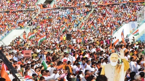 Thousands of people gathered at Lucknow's Ekana Stadium to watch Yogi Adityanath swear-in as the chief minister of Uttar Pradesh for a record straight term, on Friday, March 25, 2022. (Photo by Deepak Gupta/Hindustan Times)