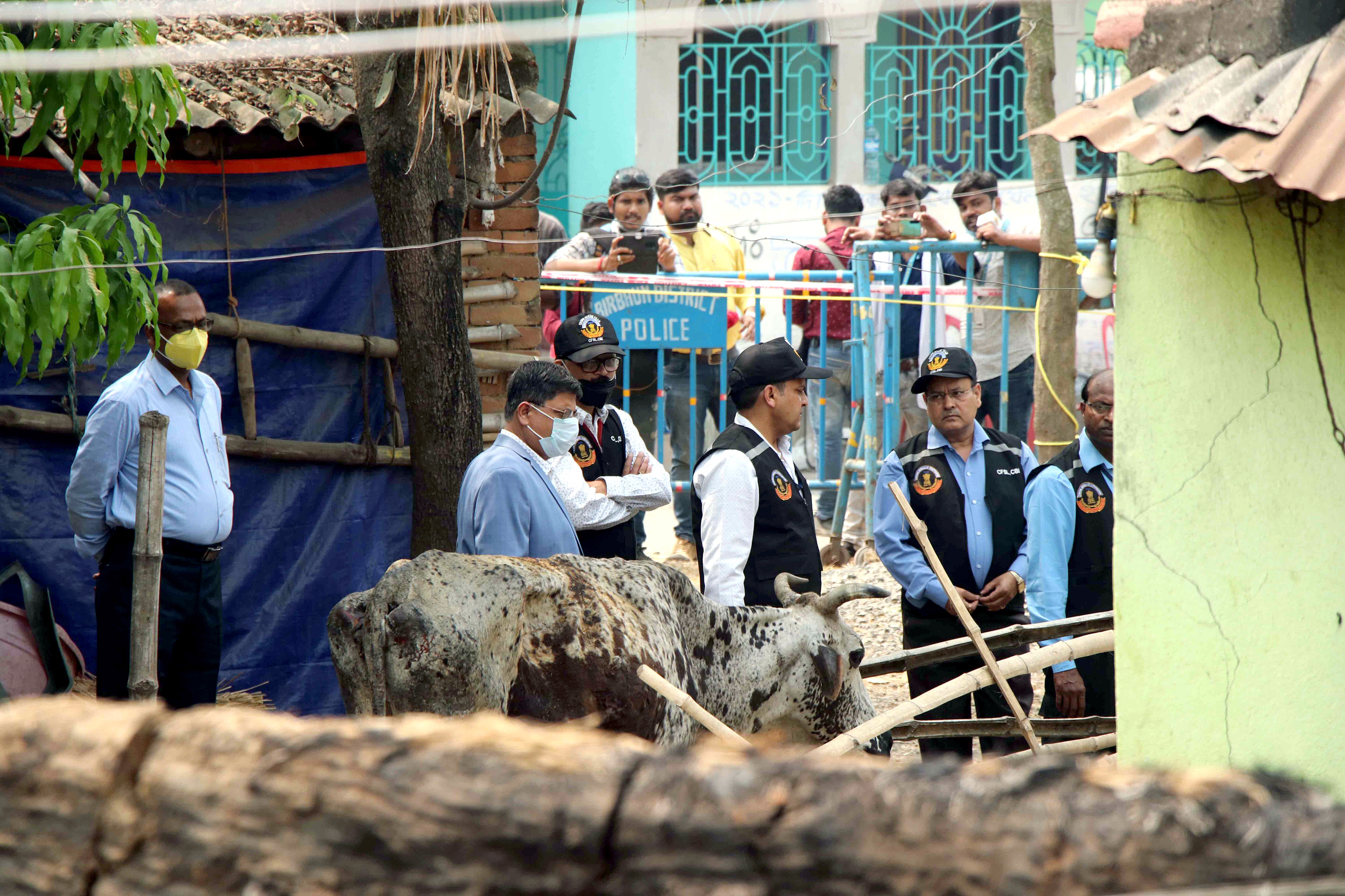 The CBI's Central Forensic Science Laboratory (CFSL) experts collect samples from the houses at Bogtui village, in Birbhum on March 25, 2022. (ANI) The CBI's Central Forensic Science Laboratory (CFSL) experts collect samples from the houses at Bogtui village, in Birbhum on March 25, 2022. (ANI)