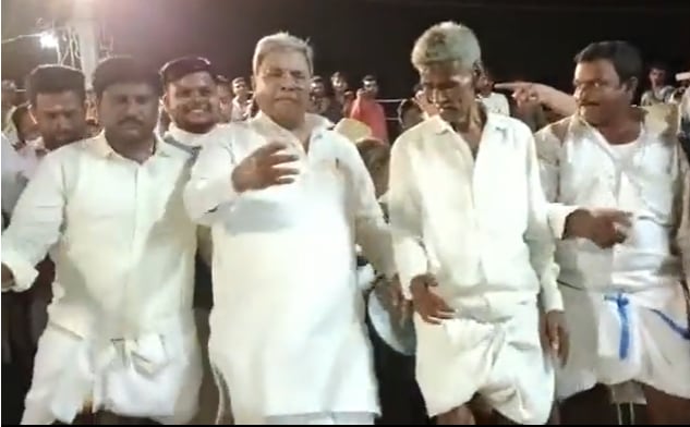 Former CM Siddaramaiah performing a folk dance at his native village of Siddaramana Hundi in Mysuru. Former CM Siddaramaiah performing a folk dance at his native village of Siddaramana Hundi in Mysuru.