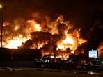 Smoke billows from a fire at Saudi Aramco's petroleum storage facility after an attack in Jeddah, Saudi Arabia March 25, 2022.