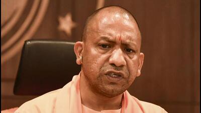 Uttar Pradesh chief minister Yogi Adityanath at a press conference in Lucknow. (PTI PHOTO)